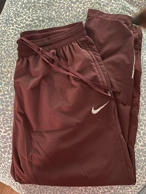 Maroon Nike joggers